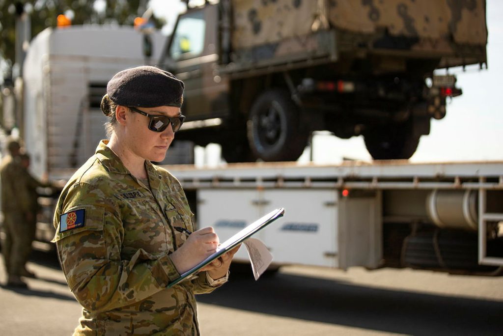 ustralian Army soldier Private Kirralee Gillespie from the 1st Joint Movement Unit fills out required paperwork for vehicle movement at Lavarack Barracks, Townsville. Photo provided by Department of Defence - Image Gallery